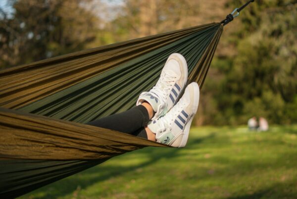 closeup shot of legs of a person with shoes