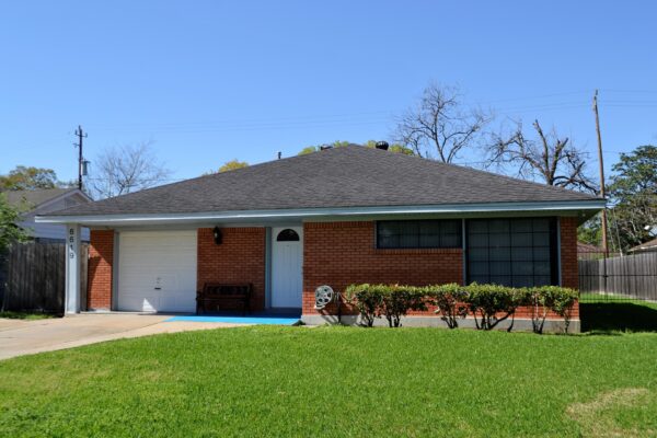 Front view of a house with a garden